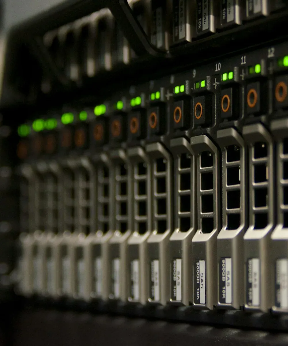 Rows of drive trays in a storage rack.