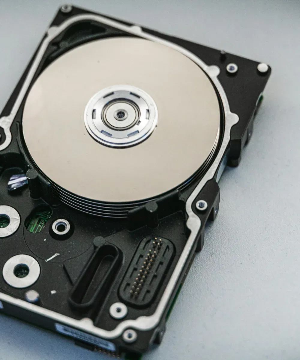 An opened hard disk drive.