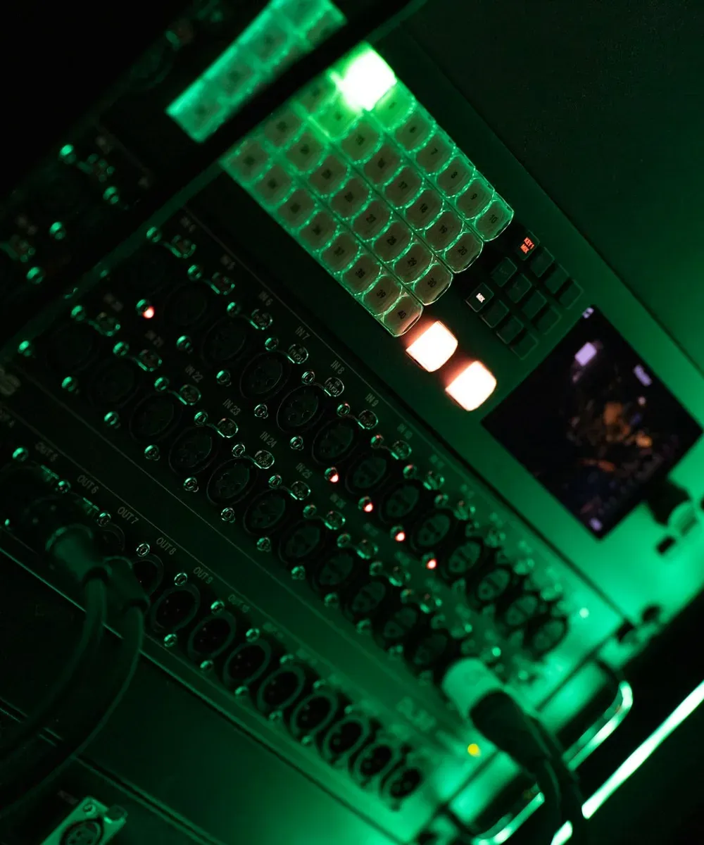 Green status lights on an equipment panel.