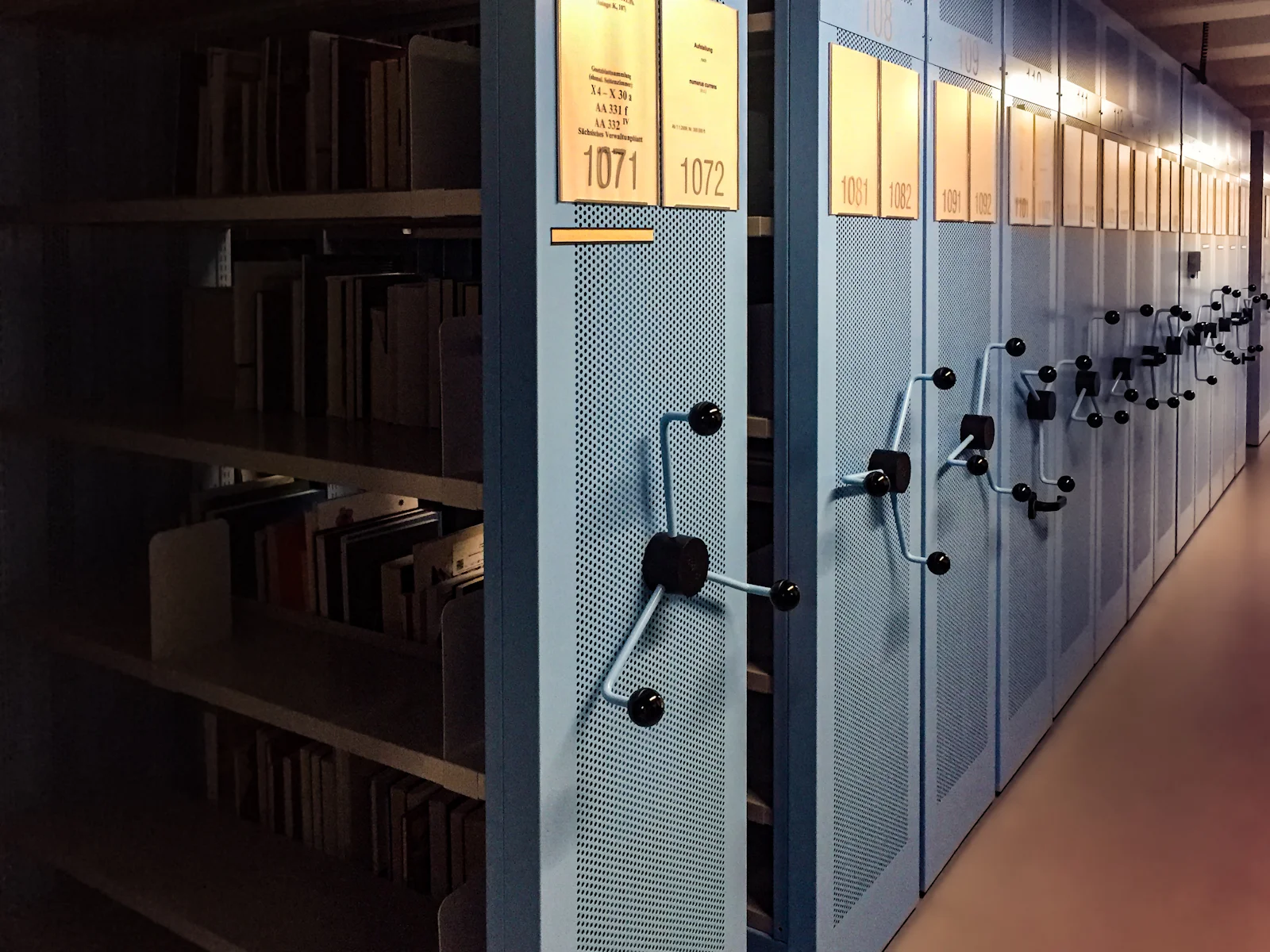 Mobile archive shelving filled with files